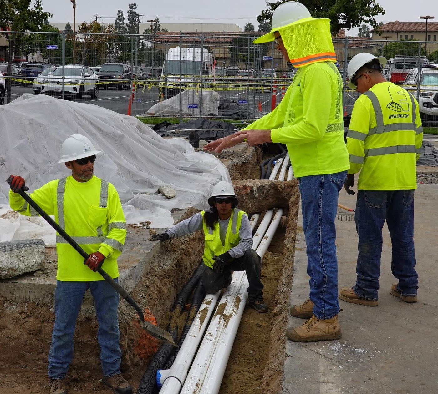 ERG field crew installing conveyance piping