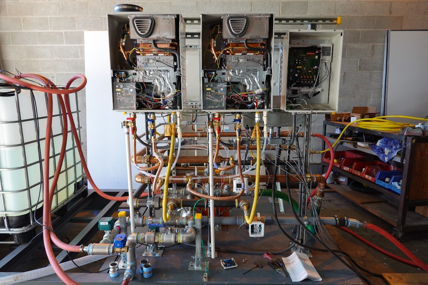 ThermaCycle heater and manifold skid under assembly and factory testing in the shop